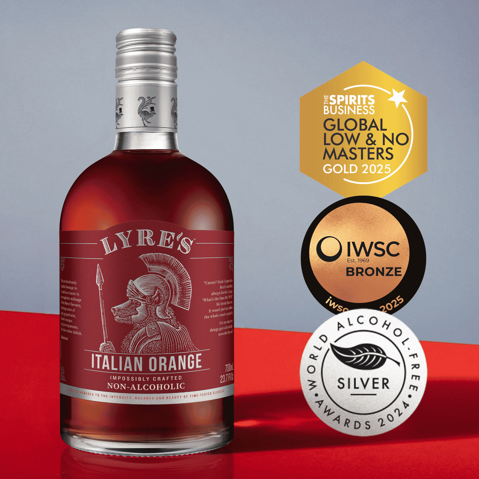 Bottle of Lyre's Italian Orange non-alcoholic spirit with awards on a red and gray background