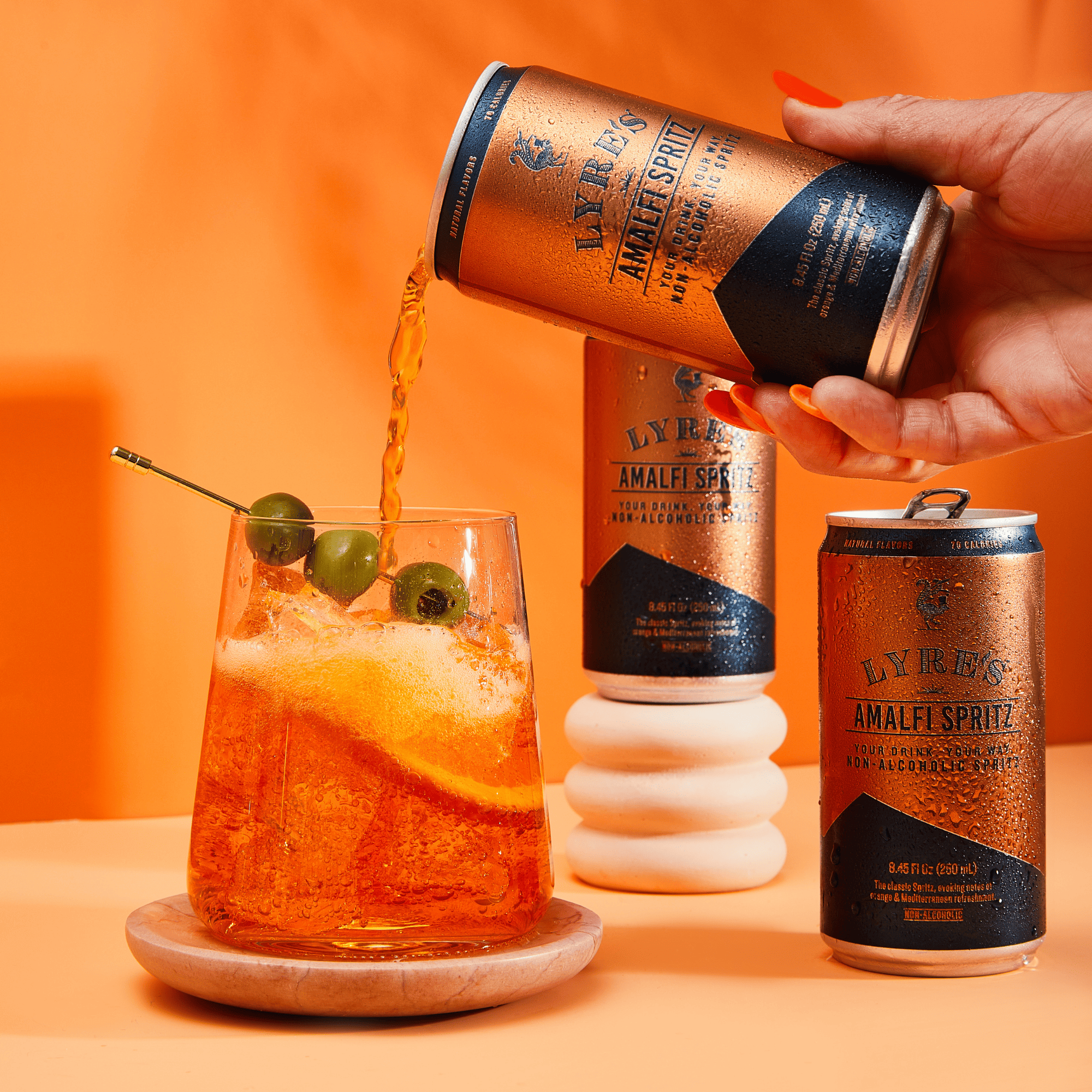 Lyre’s Amalfi Spritz can being poured into a glass