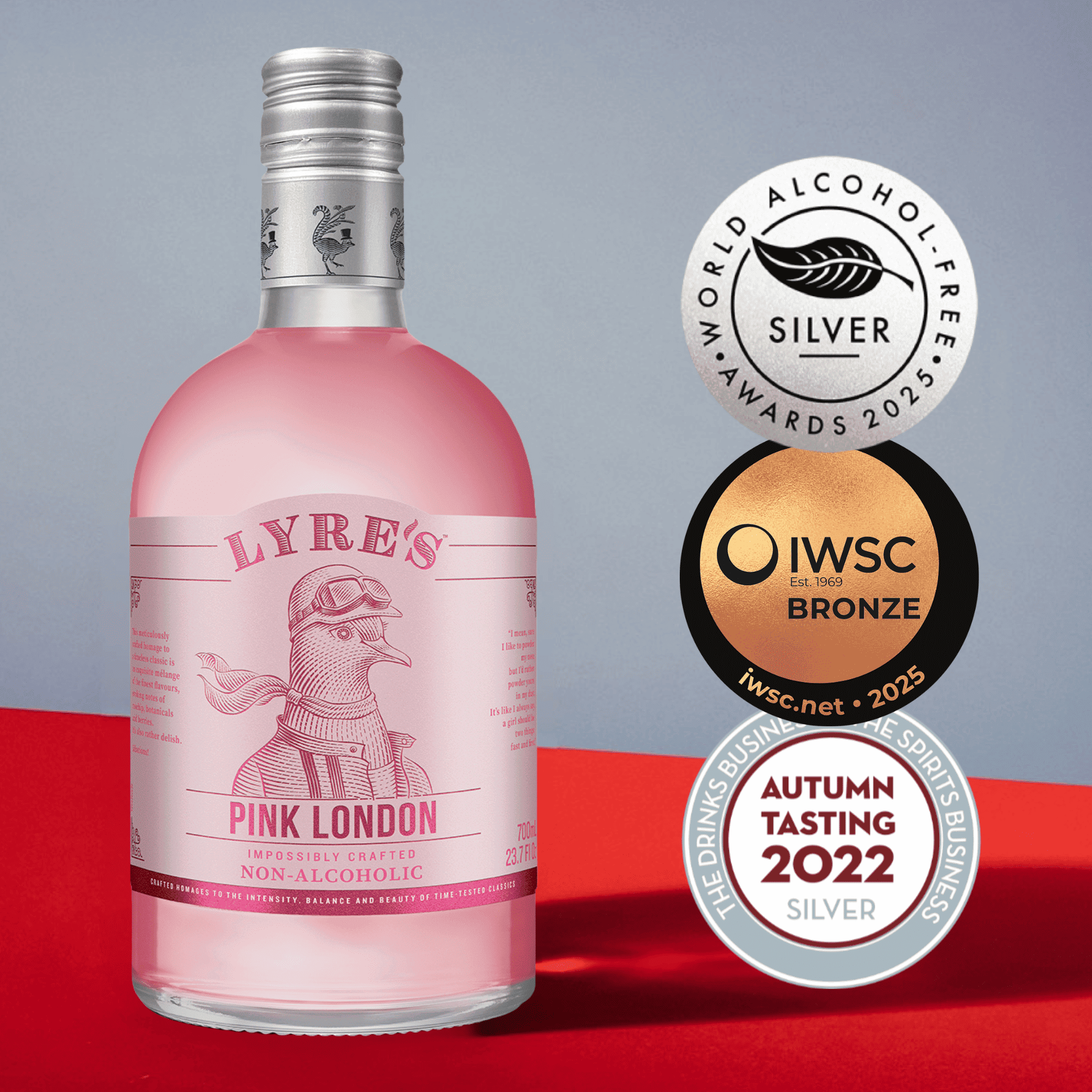 Lyre's Pink London bottle on a red and gray background, featuring awards on the right.