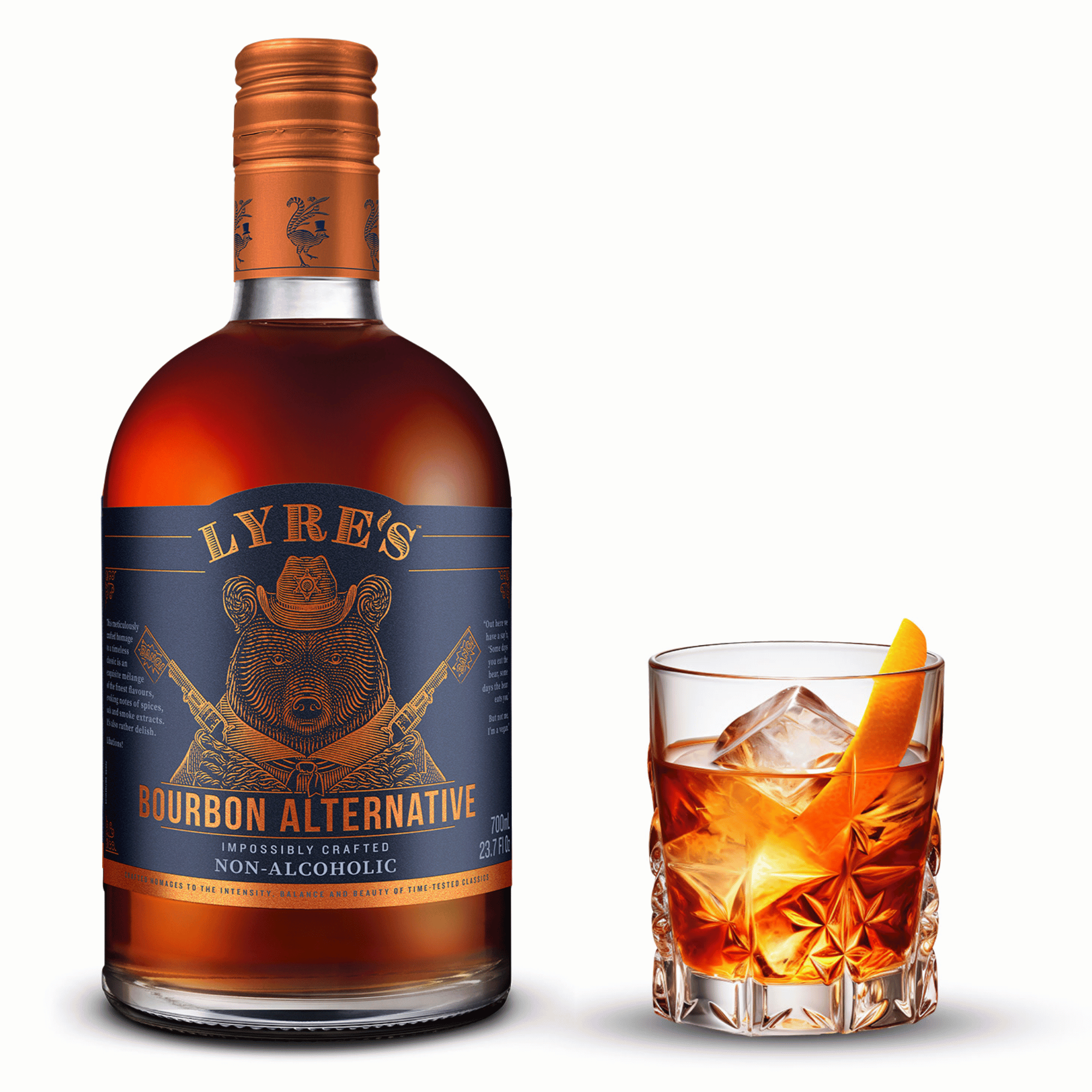 Lyre's Bourbon Alternative and a glass of Old Fashioned with an orange peel on a white background