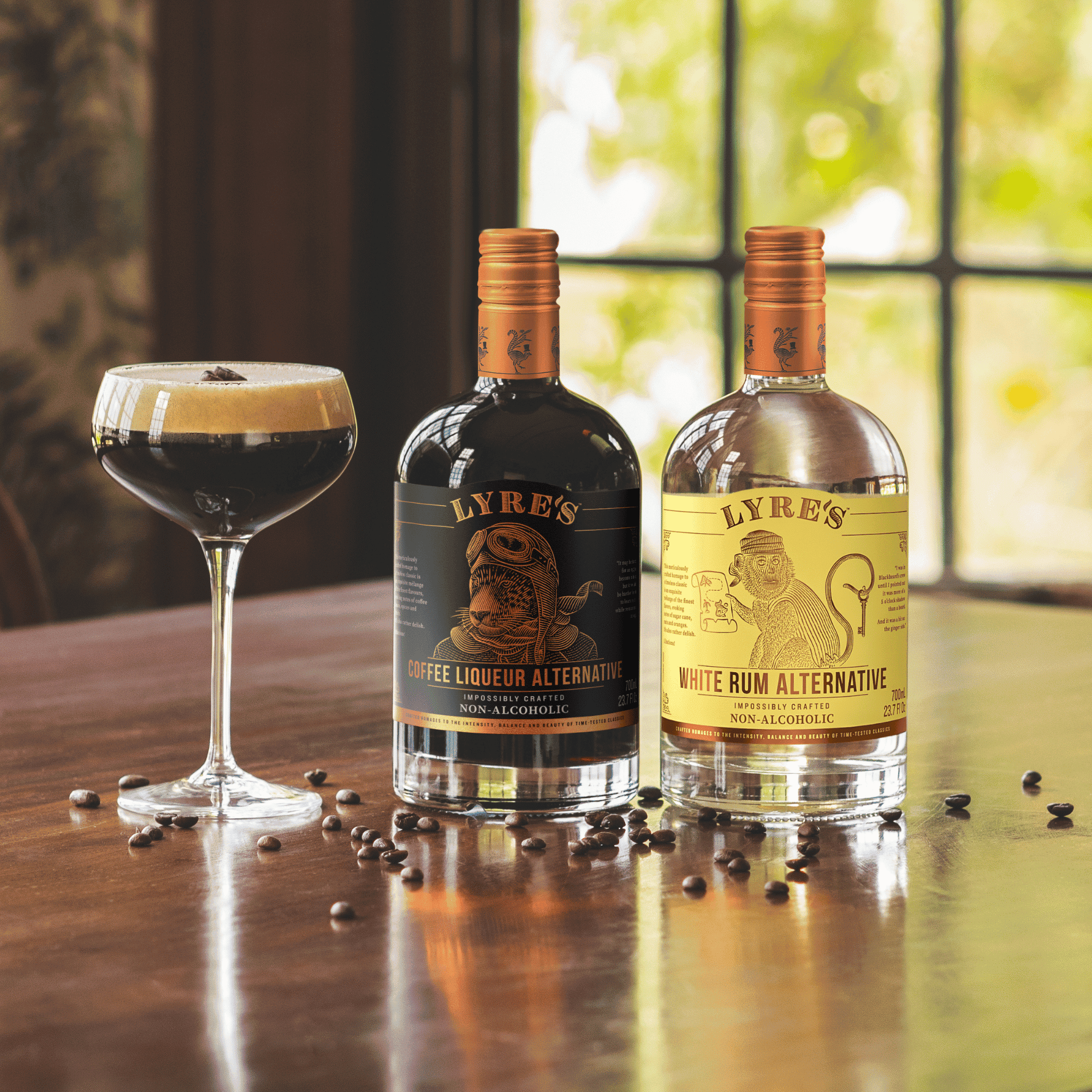 Lyre's non alcoholic Coffee Liqueur and White Rum alternatives next to an espresso martini cocktail on a table